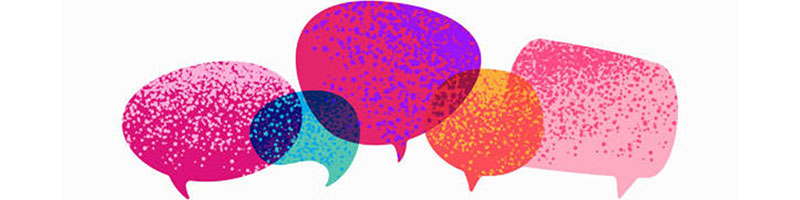Several pink, purple, orange and blue speech bubbles on white background. 