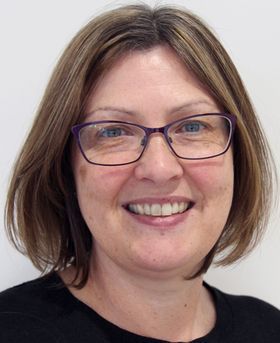 Headshot of Tracy Palmer.