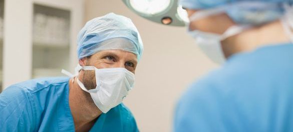 Two surgeons in their PPE. 