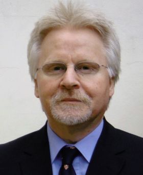 Headshot of George Salmond.