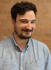 Headshot of Adam Scales