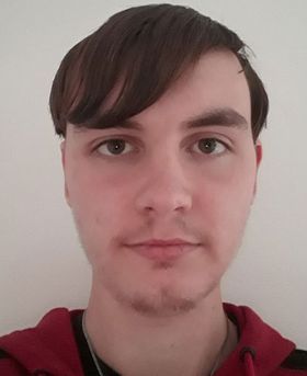 Headshot of Zac Newland Smith.