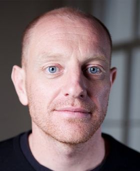 Headshot of Stephen Baker.