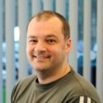 Headshot of Alan Parker.